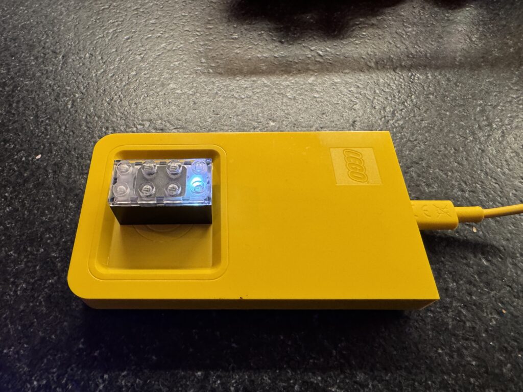 LEGO SmartBrick and charger